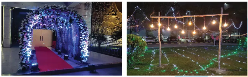 Decorated entrance passage and garden lighting for an evening event