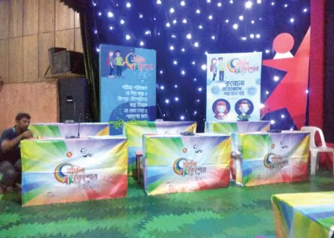 Star-lit stage backdrop with printed side panels for a ceremony